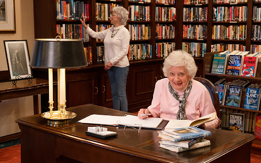 Ginger Cover residents in the library