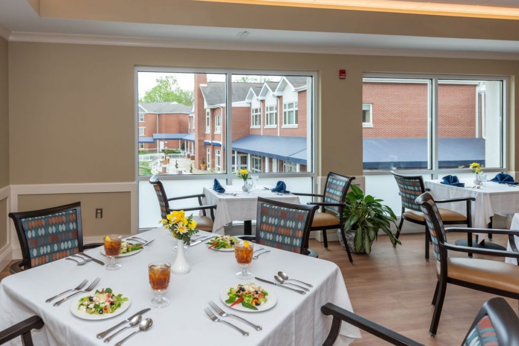Ginger Cove Independent Living dining area with salads on table