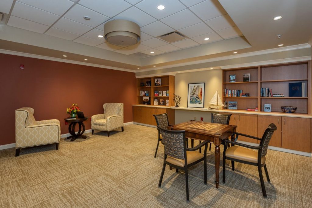 Ginger Cove Independent Living common area with table and armchairs