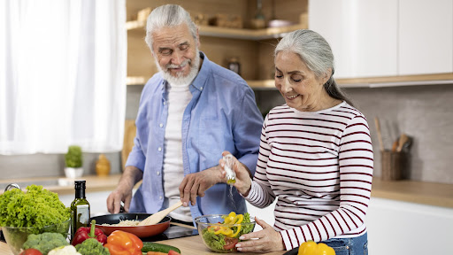 seniors-preparing-a-healthy-meal-at-home-without-any-foods-to-avoid-after-60