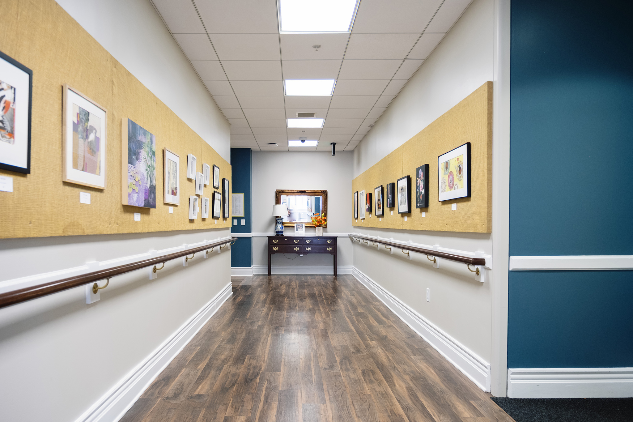 Ginger Cove interior hallway featuring original artwork